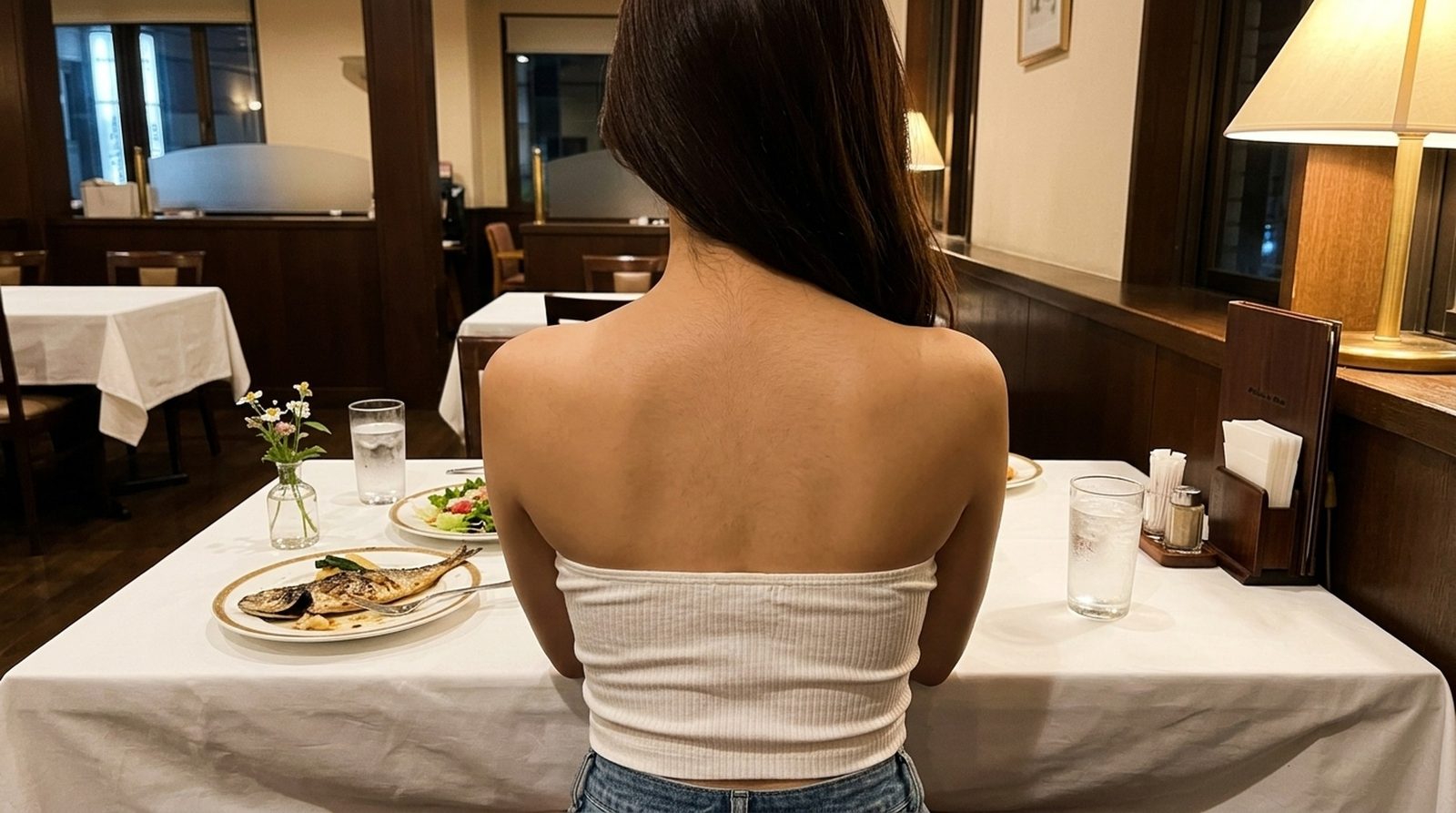 おすすめパパ活アプリで会った相手とレストランに座る後ろ姿